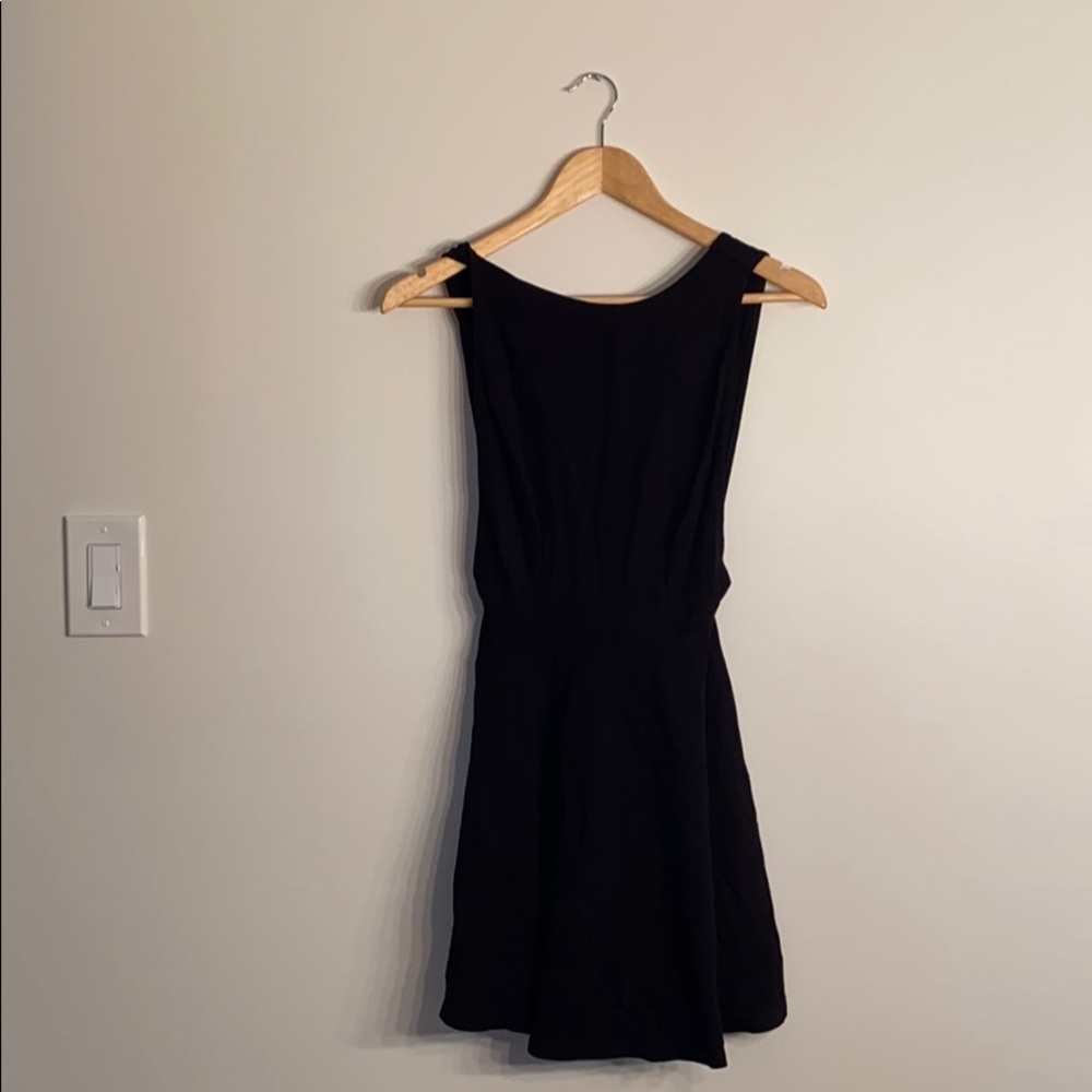 Black dress with open sides and back
